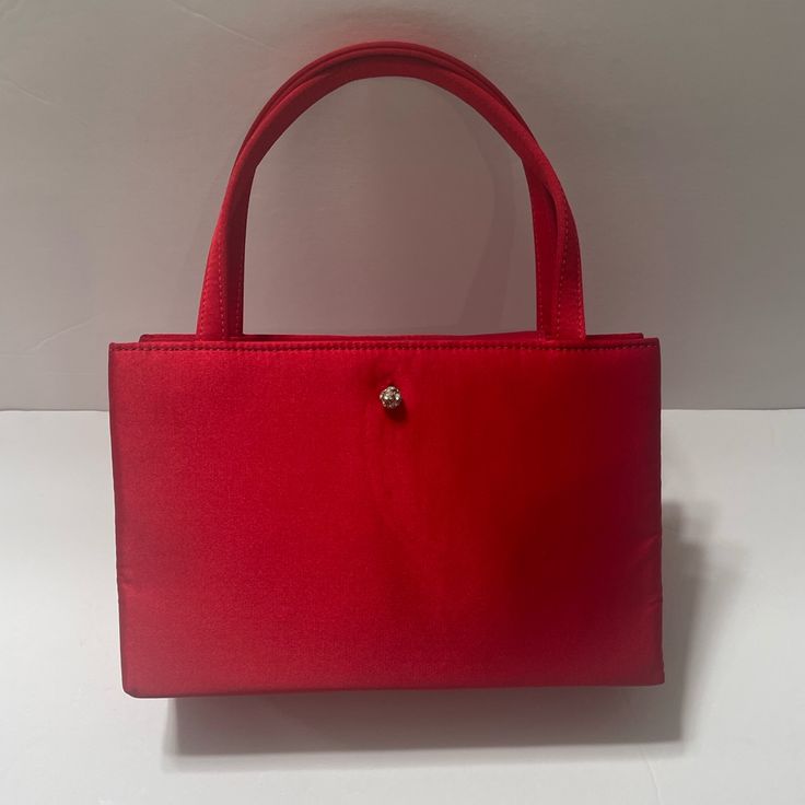 This A Brand New Never Used Kate Spade Made In Usa Small Red Night Handbag. It’s In Perfect Condition And Is Very Beautiful & Versatile. Great For A Night Out Or For Practical Every Day Use! Measurements: 5l 9h 2w At Bottom 3.5w At Top Red Square Box Bag With Top Carry Handle, Red Square Box Bag With Top Handle, Red Satchel Evening Bag For Party, Red Box Bag For Shopping, Red Shoulder Evening Bag, Red Rectangular Evening Bag With Detachable Handle, Red Clutch Evening Bag For Shopping, Versatile Red Top Handle Evening Bag, Red Square Bag For Formal Occasions