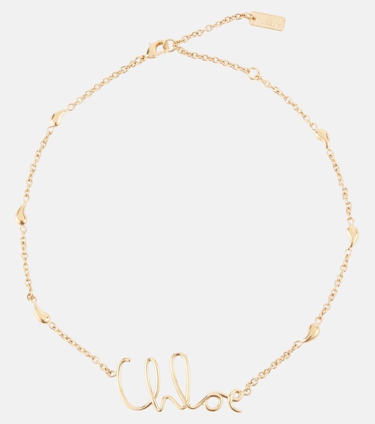 C Chloé logo necklace in gold - Chloe | Mytheresa Elegant Metal Name Necklace With Adjustable Chain, Elegant Name Necklace With Adjustable Chain, Luxury Metal Choker Necklaces, Chic Yellow Gold Necklace With Lobster Clasp, Metal Pendant Necklace With Cable Chain, Metal Cable Chain Pendant Necklace, Elegant Party Name Necklace With Clavicle Chain, Chic Chain Link Metal Necklace, Chic Metal Link Choker