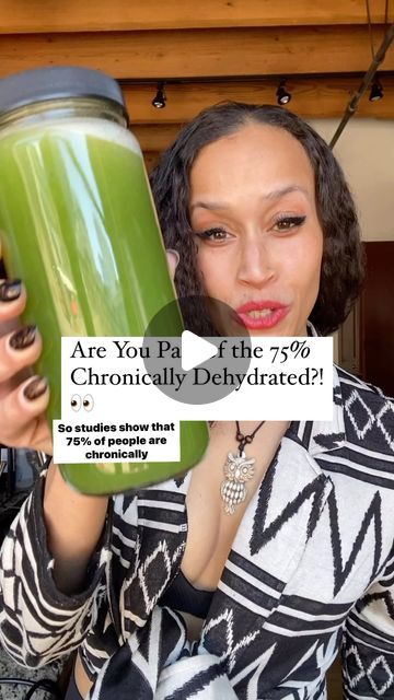 a woman holding up a green smoothie in front of her face with the caption are you pay filte? chronicly dehydraated?