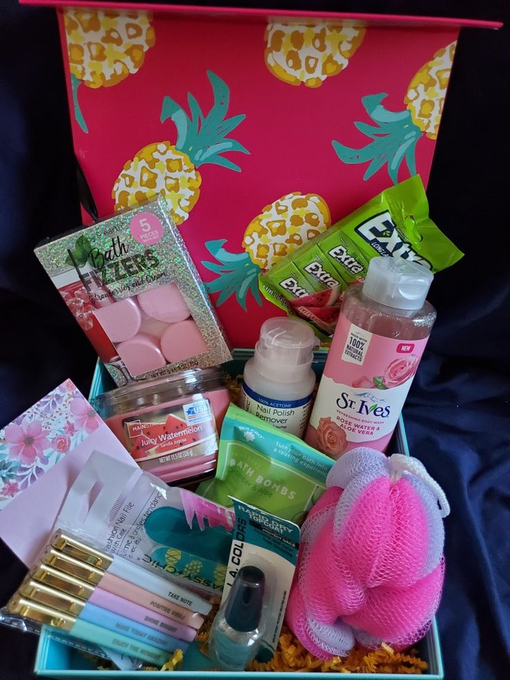 a pink box filled with lots of different items