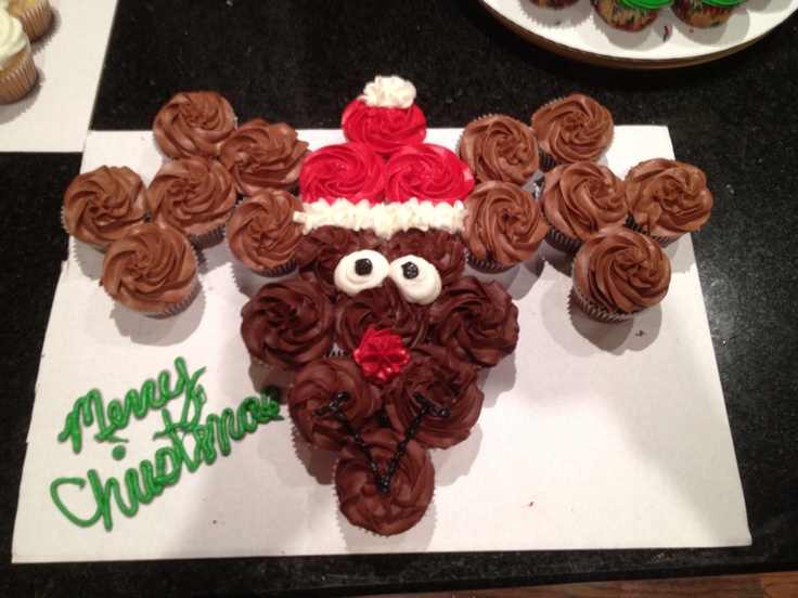 cupcakes are arranged in the shape of a reindeer