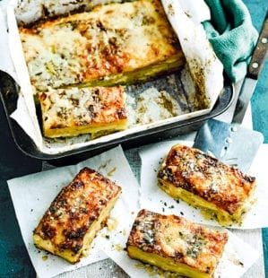 some food that is sitting in a pan on the table and ready to be eaten