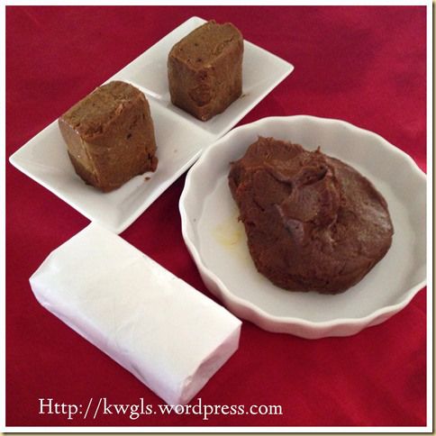 three pieces of brownie sitting on top of white plates