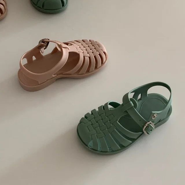 Get ready for summer adventures with our Kids Jelly Sandals! 🌞 These unisex gladiator-style sandals are perfect for children aged 1-12 years. Crafted with breathable Eva upper material and a comfortable flat heel, these sandals provide all-day comfort for little feet. The buckle closure ensures a secure fit, while the cut-outs add a stylish touch. Let your kids explore in style with these trendy and durable jelly sandals! 🌈👟 Specifications: Outsole Material: Rubber Age Range: 1-12 years Season: Summer Sandal Type: Gladiator Gender: Unisex Feature: Breathable Leather Style: Nubuck Leather Heel Shape: Flat Heels Closure Type: Buckle Upper Material: Eva Fit: Fits true to size, take your normal size Lining Material: PVC Decorations: Cut-Outs Department Name: Children Heel Type: Flat Flat Heels, Get Ready For Summer, Romper Outfit, Girls Blouse, Jelly Sandals, Comfortable Flats, Kids Sandals, Summer Adventures, Leather Style