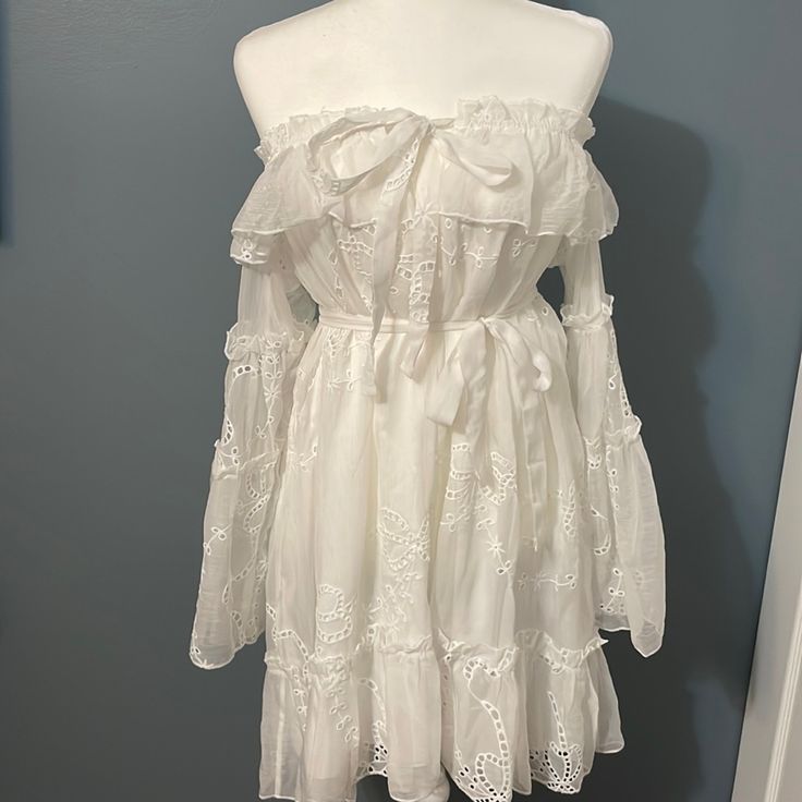 This Amazing Dress Is Flowy, Has Bell Sleeves And A White Tied Belt. Off The Shoulders And Is So Dreamy Flowy Short White Dress, Casual Off-shoulder Lace Dress, Flowy Boho Dress, Lacy White Dress, Flowy Bohemian Dresses, Southern Dresses, White Flowy Dress, Clothes Reference, Bohemian Dresses