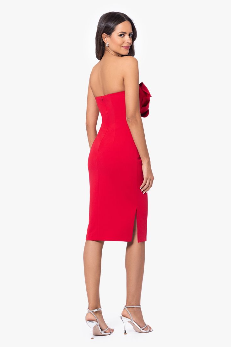 The "Danielle" Short Scuba Crepe Flower Strapless Dress radiates youthful charm and sophistication with its playful yet elegant design. Crafted from high-quality scuba crepe fabric, it offers a structured yet comfortable fit, while the delicate floral embellishments add a touch of whimsy and femininity. Perfect for cocktail parties or semi-formal events, this strapless dress is sure to make a stylish statement wherever you go. PRODUCT DETAILS: Material: Scuba Crepe Lining: Fully Lined Closure: H Elegant Strapless Elastane Dress For Date Night, Elegant Elastane Strapless Dress For Date Night, Chic Red Strapless Dress With Straight Neckline, Fitted Crepe Mini Dress For Cocktail, Red Strapless Dress With Straight Neckline For Evening, Strapless Party Midi Dress, Strapless Elastane Midi Dress For Party, Chic Strapless Elastane Party Dress, Elegant Red Strapless Dress For Cocktail