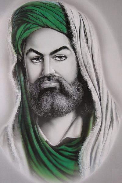 a man with a green turban on his head