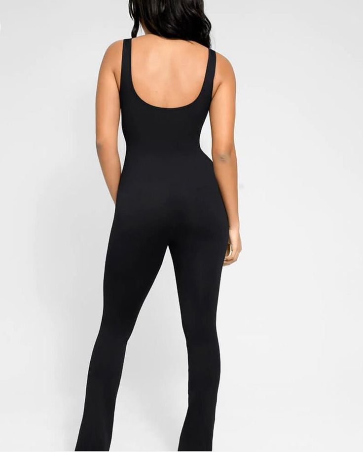 Black Seamless Snatching Flare Jumpsuit   | Veronica Luxe Black Stretch Jumpsuits And Rompers In Elastane, Black High Stretch Seamless Jumpsuits And Rompers, Sleek Black Elastane Jumpsuits And Rompers, Black Stretch Jumpsuits And Rompers With Seamless Construction, Sleek Black Stretch Jumpsuits And Rompers, Black Fitted Strapless Jumpsuit, Black Strapless Fitted Jumpsuit, Black Fitted Strapless Elastane Jumpsuit, Black Fitted Strapless Jumpsuit In Elastane