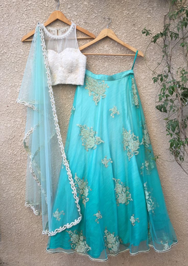 Shrena Hirawat - White Blue Lehenga Set - Trendroots Blue Net Dupatta With Resham Embroidery, Designer Lehenga With Lace Work For Festivals, Blue Resham Embroidered Net Dupatta, Blue Embroidered Lehenga In Tissue Silk, Blue Embroidered Tissue Silk Lehenga, Embroidered Blue Tissue Silk Lehenga, Blue Net Dupatta For Reception, Blue Organza Lehenga With Sheer Dupatta, Anarkali Style Blue Lehenga In Net Material