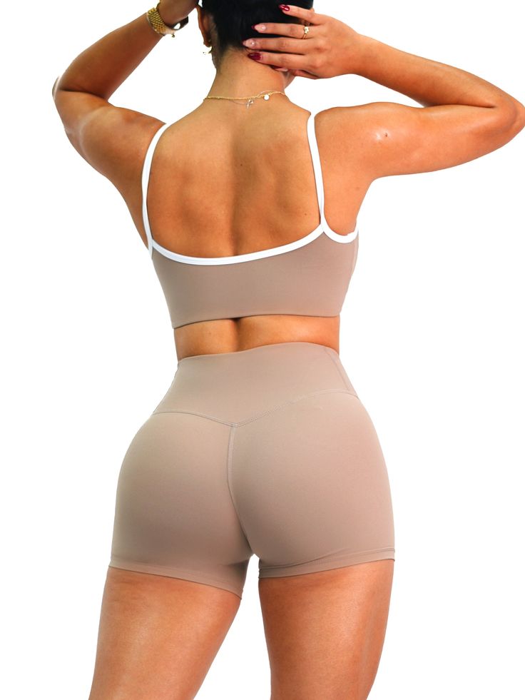 Description: This trendy design is not just stylish, but also offers superior support for all your activities. Stay comfortable and confident with this must-have sports bra. All of our sports bras are made out of high quality nylon and are well-padded to provide amazing comfort, coverage & support. Sizing: True to size Color: Stone Fabric: Active Fit Seamless Beige Stretch Athleisure Sports Bra, Beige Seamless Activewear For Gym, Beige Seamless Sporty Activewear, Bra Friendly Nylon Activewear For Sports Events, Compressive Seamless Beige Activewear, Compressive Beige Seamless Activewear, Bra-friendly Nylon Activewear For Sports Events, Beige Seamless Sports Bra, Beige Seamless Construction Sports Bra