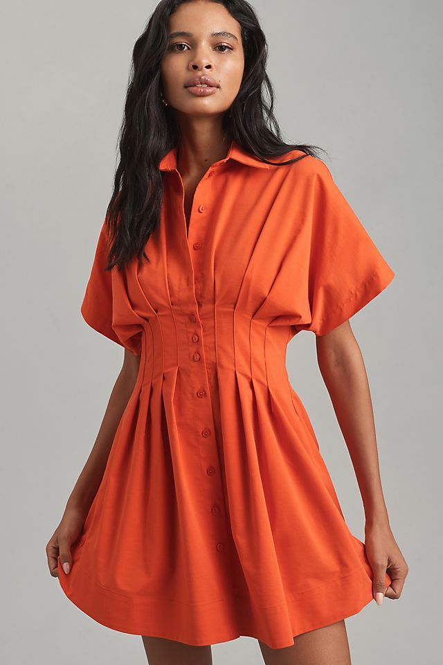 The Tobie Button-Front Pleated Shirt Dress by Exquise: Mini Edition Anthropologie Tobie Dress, Pleated Shirt Dress, Exaggerated Sleeves, Pleated Shirt, Red Fits, Christmas Fairy, Mini Shirt Dress, Flowy Dress, Shirtdress