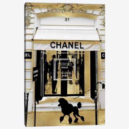 a chanel storefront with a poodle on the front and gold trimmings