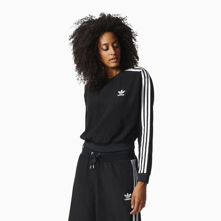 This Women's 3-Stripes Cropped Sweatshirt from Adidas is designed with a slim fit and stylish cropped length. It features the brand's iconic 3-Stripes logo on the sleeve and a wide, slightly raised neckline. Perfect for high intensity workouts or everyday activities. Color: Black White Style: BJ8182 Affordable Adidas Athleisure T-shirt, Adidas Three Stripes Sportswear Sweatshirt, Spring Adidas Logo Sportswear Sweatshirt, Adidas Sportswear Sweatshirt With Three Stripes, Adidas Three Stripes Sweatshirt Sportswear, Adidas Sporty Tops With Contrast Stripes, Sporty Adidas Sweatshirt With Three Stripes, Adidas Sporty Sweatshirt With Three Stripes, Adidas Logo Sporty Sweatshirt For Spring