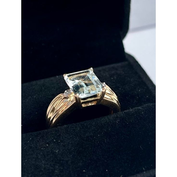 This is part of Chairish’s Fine Jewelry assortment.  DESIGNER CLYDE DUNEIER, Aquamarine & Diamond 14k Yellow Gold 2.7 Carat Ring. Ring Size: 6.5 in.  Stamped 14K, set with pale colored aquamarine. Weight of Ring: 4.9 grams Gia Certified 14k Gold Emerald Cut Sapphire Ring, Gia Certified Oval Collectible Ring, Fine Jewelry 14k Gold Gia Certified Sapphire Ring, Gia Certified Gold Sapphire Ring In 14k Gold, 14k Stamped Baguette Cut Fine Jewelry, Fine Jewelry With Stamped 14k Baguette Cut, Fine Jewelry Stamped 14k With Baguette Cut, Gia Certified 14k Gold Sapphire Ring, Formal 14k Gold Emerald Ring With Center Stone