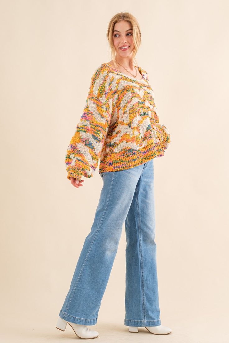 This funky patterned pullover sweater has a lot to say about bringing some excitement back into your day. The textured design and balloon sleeves are there to help you feel alive again even on the dullest of days, while the v-neck and slouchy fit offer easy comfort. Sometimes all it takes is a sweater that makes you smile. 70% Polyester, 30% Acrylic Spring Soft Knit Sweater With Balloon Sleeves, Trendy Balloon Sleeve Sweater For Fall, Trendy Balloon Sleeve Fall Sweater, Spring Sweater With Balloon Sleeves, Trendy Textured Knit Sweater With Balloon Sleeves, Trendy Textured Knit Balloon Sleeve Sweater, Casual Balloon Sleeve Spring Sweater, Trendy Balloon Sleeve Textured Knit Sweater, Trendy Spring V-neck Sweater In Chunky Knit