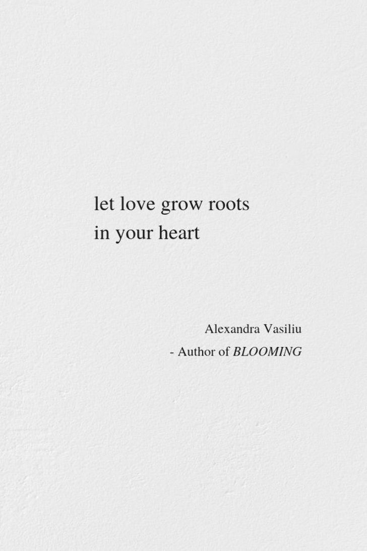 a white wall with a quote on it that says let love grow roots in your heart