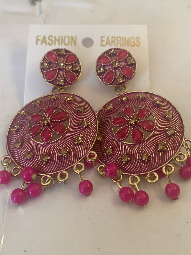 Dangling Stud Earrings Red Vintage Earrings For Festivals, Pink Round Danglers For Party, Festive Flower Drop Earrings, Pink Drop Chandelier Earrings For Festivals, Pink Chandelier Drop Earrings For Festivals, Pink Metal Earrings For Wedding, Vintage Metal Earrings For Festive Season, Traditional Round Clip-on Earrings For Parties, Round Earrings For Celebration