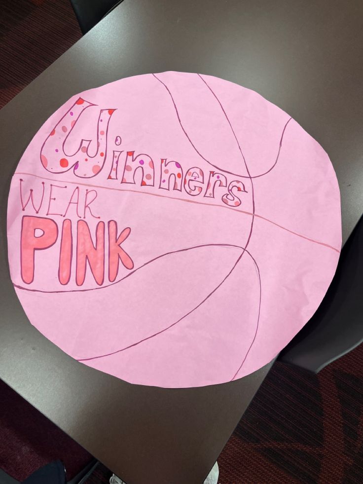 large paper pink basketball that says winners wear pink in various pink colors and patterns Pink Out Posters Basketball, Pink Student Council Posters, Pink Out Run Through Signs Football, Pink Out Signs Football, Pink Out Poster Ideas, Pink Out Posters Volleyball, Pink Out Volleyball Posters, Pink Out Game Posters, Pink Out Basketball Game