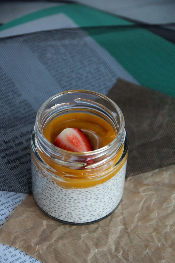 a jar filled with food sitting on top of a table