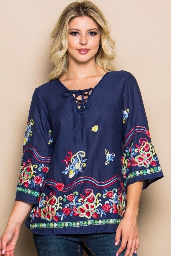 Navy Embroidered Lace Up Woven Top Embroidered V-neck Peasant Top For Beach, Spring Festival V-neck Peasant Top, Spring Folk Style V-neck Peasant Top, Spring Peasant Style Embroidered Top With Embroidered Hem, Spring V-neck Peasant Top, Casual Embroidered Top With Boho Collar For Spring, Bohemian Embroidered Top With Floral Print For Spring, Casual Peasant Top With Multicolor Embroidery For Spring, Bohemian Embroidered Top For Spring Festival