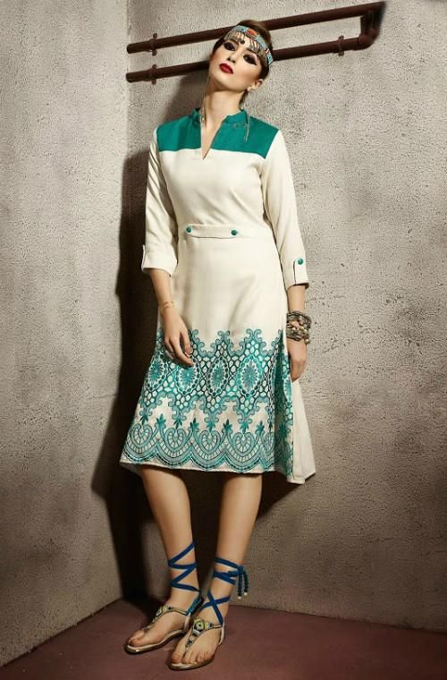 Our new winter collection features cream and green combination pashmina kurti adorned with delicate embroidery on the hem adding grace to the outfit. This unique design is a perfect ensemble for winter, not only keeping you warm but also making sure you look your very best all the time. Available as stitched (ready-to-wear). Note: There might be a slight color variation due to lighting and flash used during photoshoot. The bright shade seen is the best closer view of fabric's color. Gown Lehenga, White Pashmina, Green Combination, New Winter Collection, Party Wear Kurtis, Clothing Wholesale, Designer Blouse, Ladies Dress, Pakistani Outfits