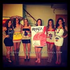 the girls are dressed up in costumes for an event and posing with one another while holding a sign that says franza