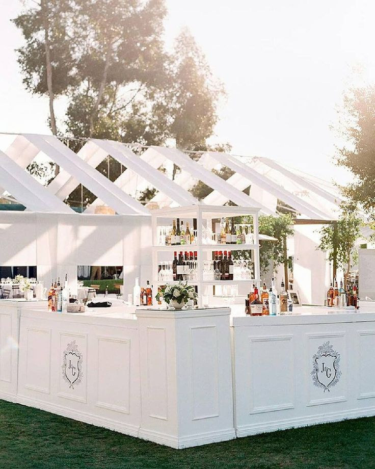 an outdoor bar set up for a party