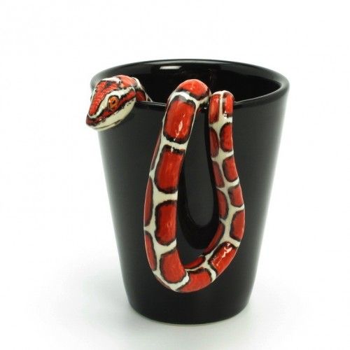 a red and white snake in a black cup