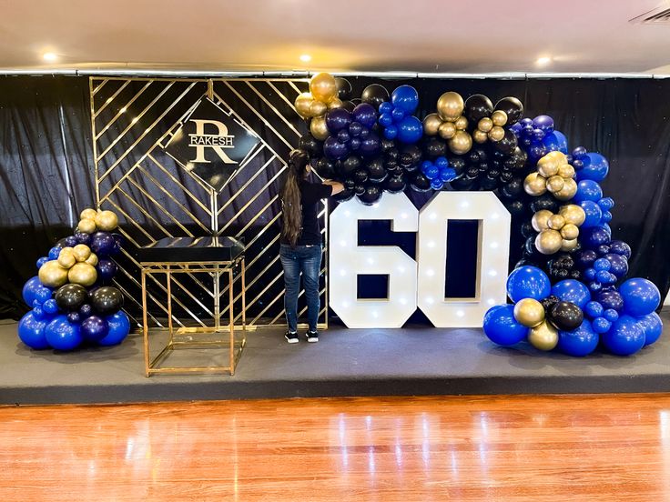 a 50th birthday party with balloons and decorations