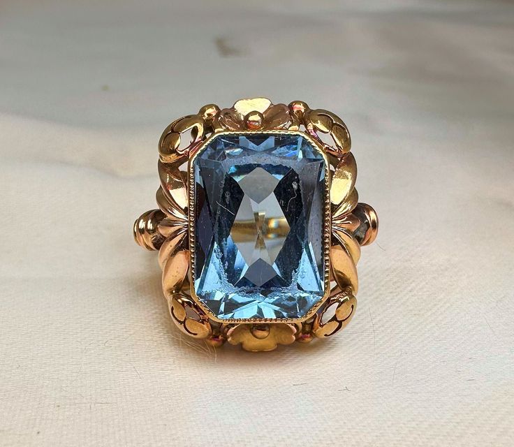 1950s Vintage German blue spinel ring, US size 7 1/4, 14k gold (585), handmade mid-century ladies ring, Art Deco, with a beautiful blue stone, the stone moves slightly (rattling), but it has been thoroughly checked by a jeweler and is secure; it won't fall out. A nice heft of the 6.7 grams of gold, would make a nice gift! Material: 14k gold (585 gold), blue spinel (sy) Total weight: 6.7 g US Size: approx. 7 1/4 (EU 56) Vintage 14k Stamped Sapphire Ring For Formal Occasions, Victorian Sapphire Ring With 17 Jewels In 14k Gold, Art Deco Yellow Gold Sapphire Ring For Gift, Art Deco 14k Gold Ring With Center Stone, Art Deco 14k Gold Rings With Center Stone, Vintage Gold Engraved Ring With Center Stone, 14k Gold Art Deco Ring With Center Stone, Vintage Signet Ring With Center Stone For Promise, Formal Art Deco Topaz Ring With Center Stone