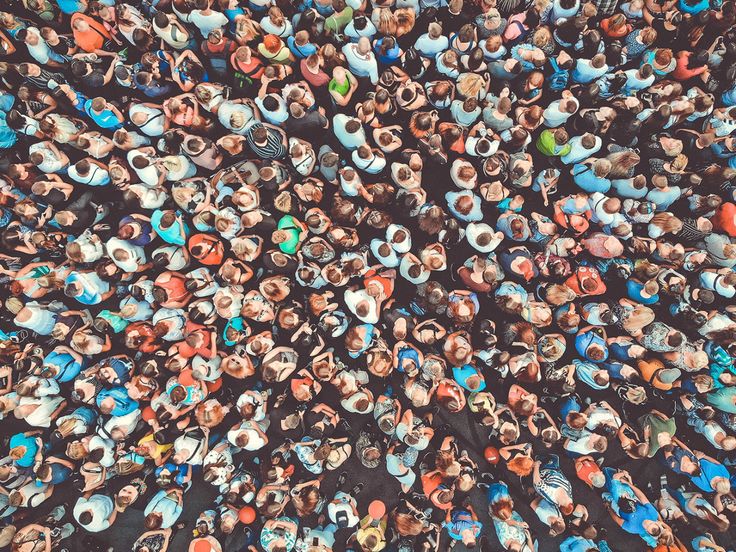 an overhead view of many people standing together