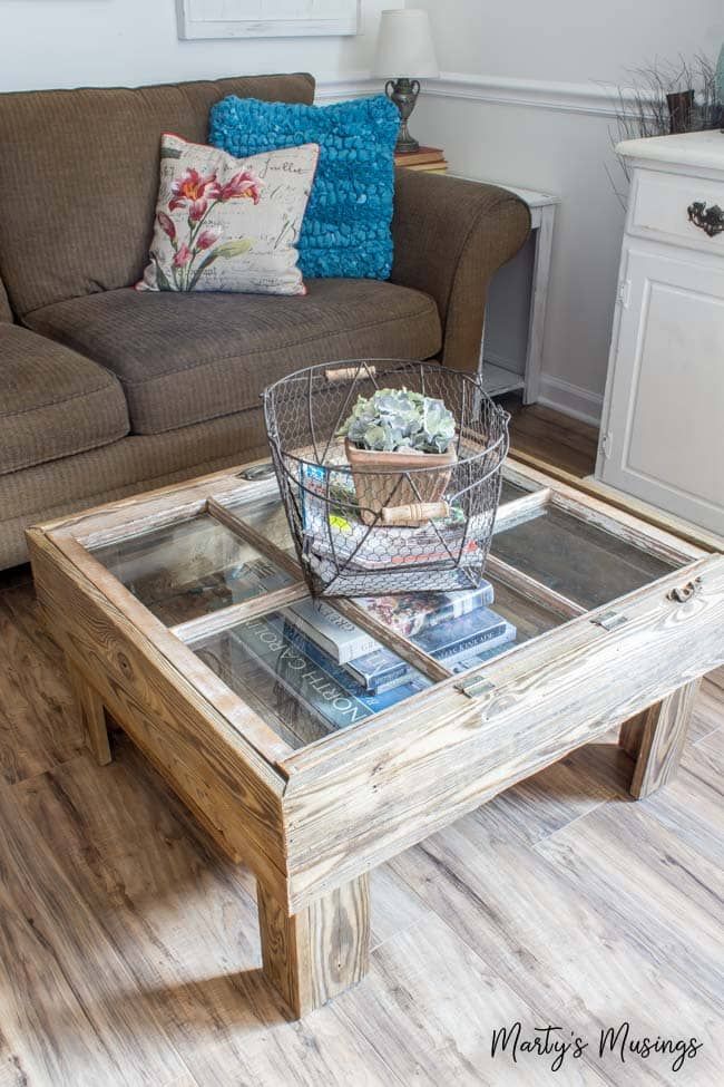 a coffee table with a basket on top