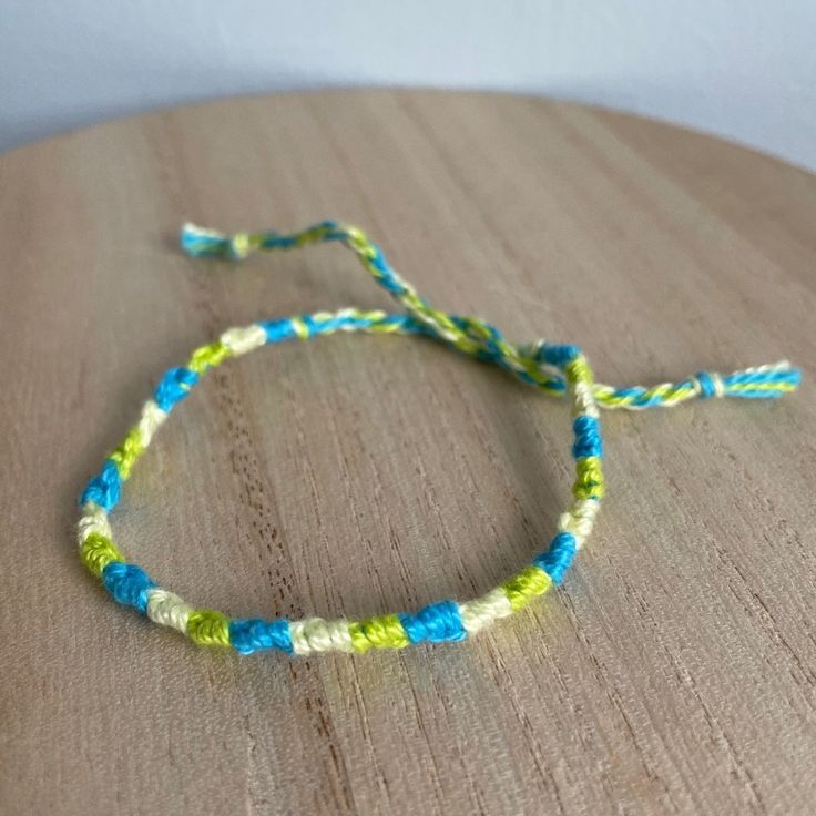 A Handmade Bracelet Or Anklet Woven With Shades Of White, Green, And Blue Colors. A Friendship Or Statement Bracelet Perfect For This Summer! Approx. 9 Inches/ 30 Centimeters Long. 10 Woven Bracelets For $25. Adjustable Turquoise Bracelets For Spring, Blue Bohemian Friendship Bracelets For Everyday, Everyday Hand-wrapped Blue Friendship Bracelets, Everyday Hand Wrapped Blue Friendship Bracelets, Blue Braided Bracelets As Summer Gift, Blue Braided Bracelets For Summer Gift, Blue Bohemian Bracelets For Spring, Blue Braided Bracelet Gift For Summer, Bohemian Blue Bracelets For Spring