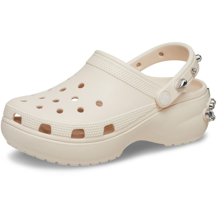 PRICES MAY VARY. What Size Should I Buy?: These Platform Women'S Crocs Offer A Roomy Fit And We Recommend Ordering A Size Up To The Next Largest Whole Size. They Also Feature Pivoting Heel Straps For A More Secure Fit Throughout The Day. Platform Shoes For Women: Reach New Heights With These Platform Crocs For Women. They Feature The Comfort And Style You Love About The Regular Classic Clogs, Plus A 1.6-Inch Platform Sole All The Way Around. Fun Platform Crocs: These Are The Crocs Women Need And Sneaker Sale, Crocs Classic Clogs, Bone Color, Winter Slippers, Platform Clogs, Comfortable Sandals, Slipper Boots, Boot Shop, Ballerinas