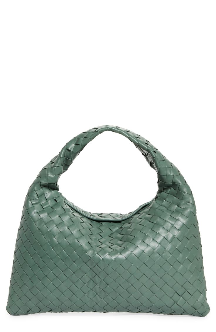 A right-sized shoulder bag is crafted in the label's signature Intrecciato style from soft lambskin leather. Top zip closure Shoulder strap Interior wall pocket Lined Leather Made in Italy Designer Handbags Luxury Shoulder Bag With Round Handle For Errands, Designer Soft Leather Shoulder Bag For Errands, Luxury Green Soft Leather Hobo Bag, Luxury Woven Leather Hobo Shoulder Bag, Formal Woven Leather Hobo Shoulder Bag, Designer Woven Leather Shoulder Bag For Errands, Luxury Green Hobo Bag With Handle Drop, Luxury Woven Leather Shoulder Bag For Errands, Bottega Veneta Intrecciato