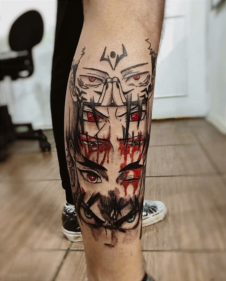 a man's leg with a tattoo on it that has an evil face and red eyes