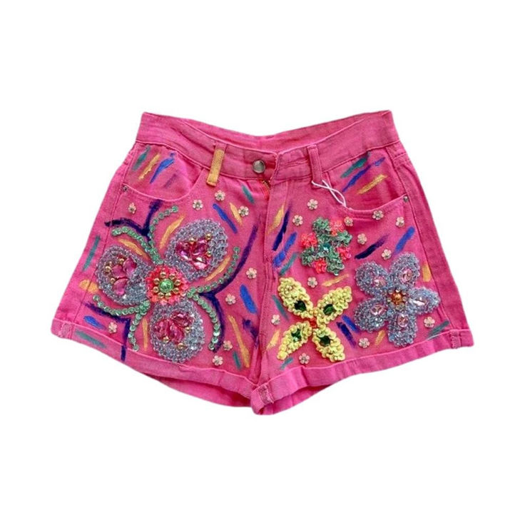 Sarong yourself in the elegance of our Pink Rhinestone Flower Denim Shorts from the 2023 Summer Collection! These millennium-style mid-waist straight jeans are the perfect combination of traditional charm and vogue fashion. Crafted from premium denim. these shorts feature a zipper and button closure. adding a touch of contemporary sleekness to the overall aesthetic. The intricate pattern embellishments create a narrative of luxury and grandeur. making these shorts an essential piece for any tren Rhinestone Jean Shorts For Summer, Spring Rhinestone Jean Shorts, Rhinestone Jean Shorts For Spring, Casual Rhinestones Bottoms For Spring, Trendy Embellished Spring Jeans, Trendy Embellished Jeans For Spring, Pink Short Jeans For Spring, Spring High Waist Embellished Jeans, Embellished Jean Shorts For Summer