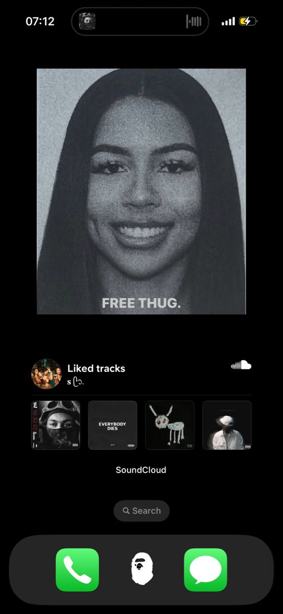 an iphone screen with the message free thug on it and two different icons in front