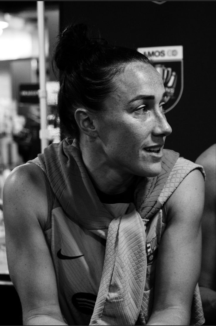 black and white photograph of a woman wearing a scarf