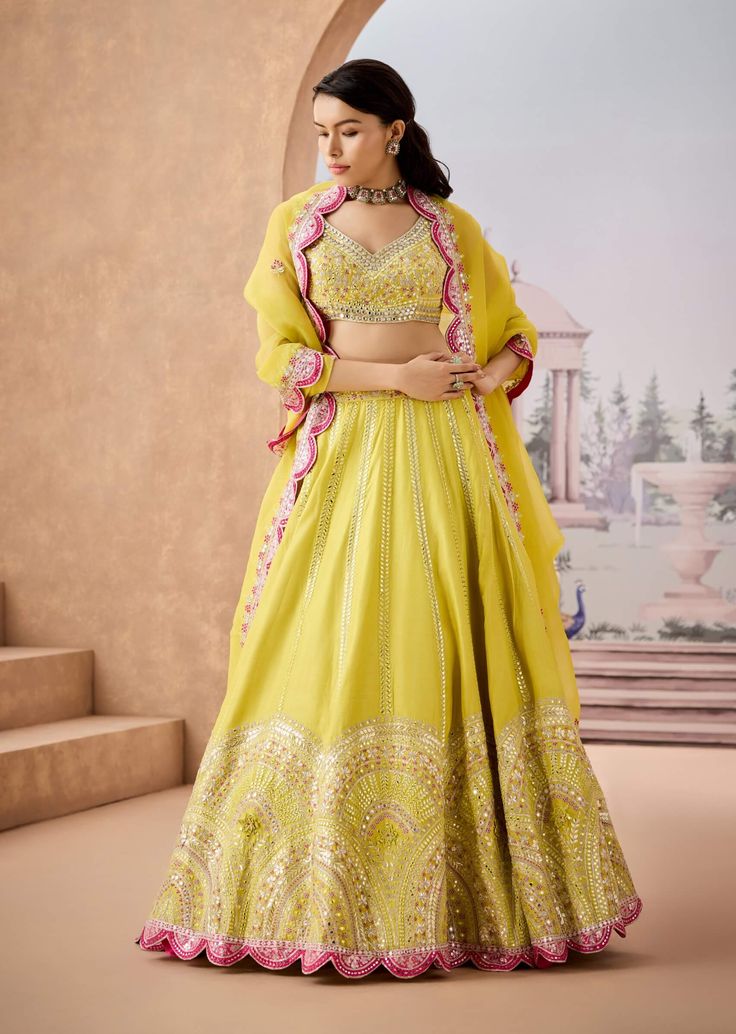 Illuminate your style with this vibrant lime yellow silk lehenga, beautifully embroidered with sequins and mirrors. Adorned with exquisite 3d floral details, this piece captures the essence of elegance and joy. Perfect for festive occasions, it effortlessly blends tradition with a fresh, modern flair, making you the center of attention wherever you go. Yellow Silk Lehenga, Yellow Lehenga, Lime Yellow, Embroidered Lehenga, Yellow Silk, Dupion Silk, Silk Lehenga, Indian Design, Embroidered Silk