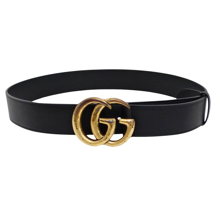 Introducing the Gucci Marmont Belt, an embodiment of luxury and timeless style. Crafted from genuine black leather, this exquisite accessory features the iconic GG logo buckle in antique brass, adding a touch of sophistication to any outfit. The meticulous design and superior craftsmanship reflect Gucci's dedication to quality and elegance. Perfect for both casual and formal occasions, this belt is versatile and stylish, making it a must-have addition to your wardrobe. Elevate your fashion game with the Gucci Marmont Belt, where classic design meets modern flair. This belt is a wardrobe essential that effortlessly enhances any outfit. The versatile black leather pairs seamlessly with a wide range of styles, making it the ideal choice for any occasion. Wear it in countless ways – cinch it a Luxury Gucci Leather Belt Buckles, Elegant Black Gucci Belt Buckles, Gucci Black Luxury Belt, Luxury Gucci Black Belt Buckles, Gucci Marmont Belt, Gucci Luxury Belt With Gold-tone Logo Plaque, Gucci Marmont, Gucci Brand, Gucci Outfits