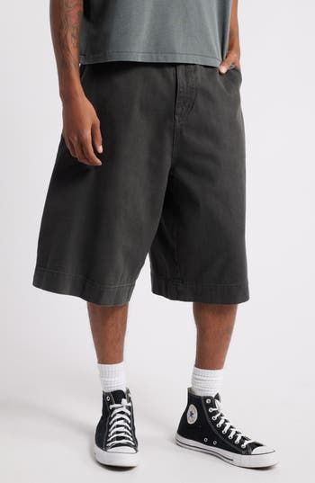 Relaxed and very roomy, these shorts cut from soft cotton twill hit well below the knee and slouch like they're your most comfortable old favorites. Exclusive retailer 13 1/2" inseam; 32" leg opening; 15" front rise; 19" back rise (size 32) Zip fly with button closure Front slant pockets; back patch pockets 100% cotton Machine wash, tumble dry Imported Knee-length Cotton Bottoms With Pockets, Cotton Knee-length Shorts For Streetwear, Casual Wide-leg Bermuda Shorts With Pockets, Knee-length Cotton Cargo Shorts For Spring, Wide Leg Cotton Shorts For Streetwear, Cotton Knee-length Bermuda Shorts For Spring, Knee-length Cotton Bermuda Shorts For Spring, Washed Black Cotton Bottoms For Streetwear, Spring Bermuda Shorts Relaxed Fit For Streetwear