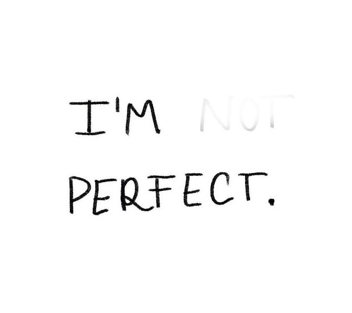 the words i'm not perfect are written in black ink on a white background