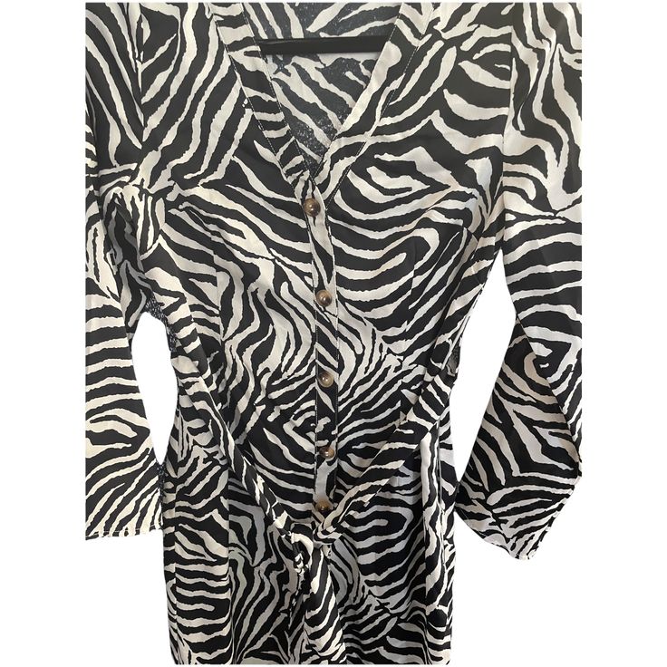 Satin dress with a fabric belt Zebra design Side zipper Decorative buttons No stretch on this beautiful dress V-neck Zebra Print Party Dress, Fitted Mini Dress With Tie Waist For Casual Wear, Black Zebra Print V-neck Dress, Spring Midi Dress In Zebra Print, Spring Midi Dress With Zebra Print, Casual Zebra Print Mini Dress, Zebra Print V-neck Party Dress, Fitted Zebra Print Mini Dress, Chic Zebra Print V-neck Dress