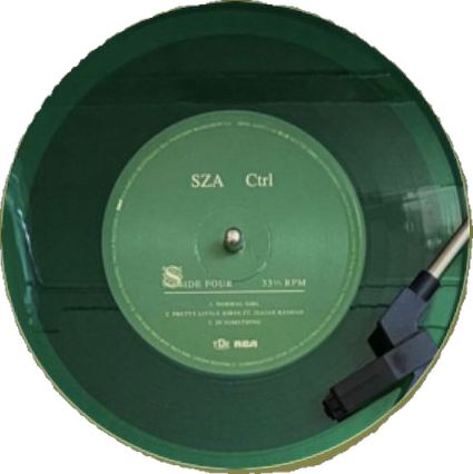 a green record that is sitting on top of a white surface with the words sza crt in it