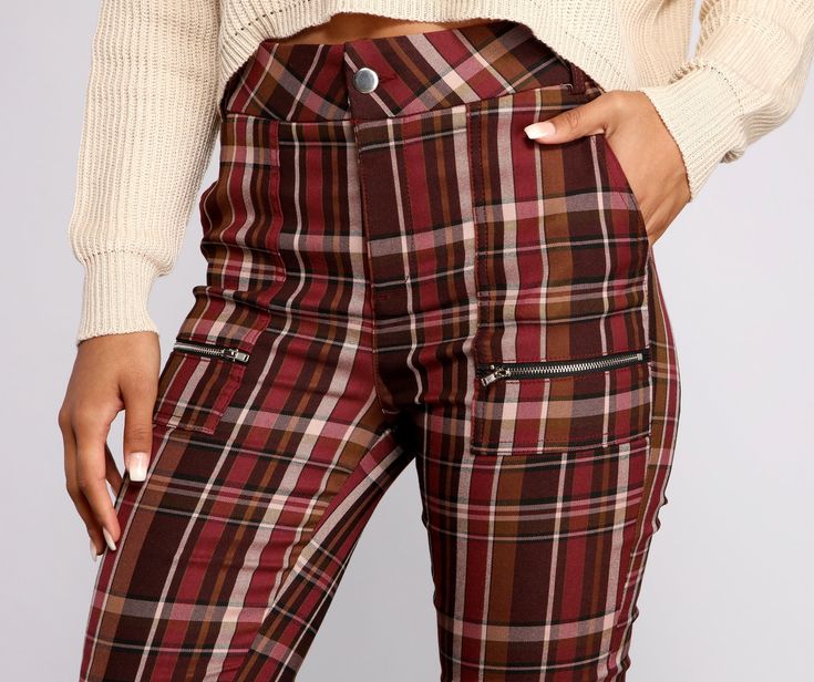 Keep it preppy in plaid pants that are perf for creating chic back to school outfits. The pants feature a mid-rise fit. slant pockets. a single button with zipper closure. two small zippered pockets. and a plaid print. The pants are composed of a stretchy woven fabric that offers a form hugging fit. Complete look with a faux leather jacket.Fit & Features Mid-rise fit Single-button with zipper closure Slant pockets Two zippered pockets Belt loops Plaid print Stretchy woven fabric with skinny leg Plaid Bottoms For School In Fall, School Pants With Pockets For Fall, Fall School Pants With Pockets, Plaid Bottoms With Pockets For Business Casual, Trendy Plaid Bottoms With Pockets, Trendy High-waisted Plaid Pants, Preppy Plaid Bottoms For Fall, Fall Bottoms With Pockets, Fall School Bottoms With Pockets