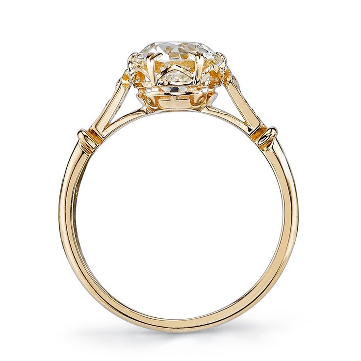 2.02ct N/VVS2 GIA certified old European cut diamond with 0.07ctw old European cut accent diamonds prong set in a handcrafted 18K yellow gold mounting. Vintage Yellow Gold Cushion Cut Diamond Ring, Classic Gold Cushion Cut Diamond Ring, Timeless Cushion Cut Diamond Ring With Rose Cut Diamonds, Timeless Yellow Gold Rose Cut Diamond Ring, Yellow Gold Moissanite Asscher Cut Ring For Wedding, Yellow Gold Moissanite Asscher Cut Ring, Asscher Cut Moissanite In Yellow Gold For Wedding, Heirloom Moissanite Single Diamond Wedding Ring, Timeless Rose Cut Diamond Wedding Jewelry