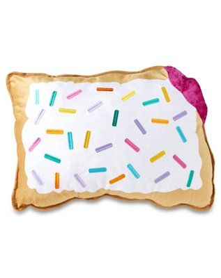 a pillow with sprinkles on it and a doughnut in the middle