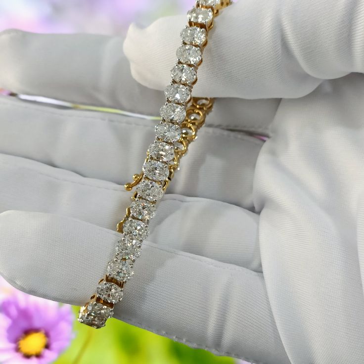 "Oval Diamond Tennis Bracelet | Lab Grown Diamond Bracelet | 14K Yellow Gold Oval Diamond Bracelet | Wedding Gift | Oval Lab Diamond Bracelet ◆𝐃𝐢𝐚𝐦𝐨𝐧𝐝 𝐃𝐞𝐬𝐜𝐫𝐢𝐩𝐭𝐢𝐨𝐧 ➺ Diamond: Lab Grown Diamonds ➺ Shape: Oval Brilliant Cut ➺ Diamond Color: E/F ➺ Diamond Clarity: VVS/VS ➺ Stone Size: 5.45 x 3.85 MM ➺ Each Diamond Weight: 0.32 Each ➺ Total Diamond Wt.: 13.00Ct. ➺ No. of Diamonds: 40 ◆𝐁𝐫𝐚𝐜𝐞𝐥𝐞𝐭 𝐃𝐞𝐭𝐚𝐢𝐥𝐬 ➺ Metal purity: 14k Yellow Gold (Also Available in 10,18 Kt.) ➺ Met Luxury Oval Diamond Cut Tennis Bracelet, Luxury Oval Link Diamond Bracelet For Weddings, Luxury Oval Diamond Cut Bracelet, Luxury Oval Diamond Bracelet For Anniversary, 14k Gold Diamond Cut Wedding Bracelet, Wedding 14k Gold Diamond Cut Bracelets, Yellow Gold Diamond Bracelet With Vvs Clarity For Wedding, Luxury Oval Link Bracelet For Anniversary, Luxury White Oval Diamond Bracelet