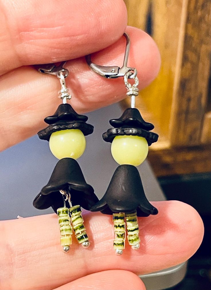 Super cute Witch dangle earrings. Striped stockings and black dress with black hat. So cute and light. Perfect for Halloween! Novelty Black Earrings For Party, Novelty Black Party Earrings, Whimsical Black Earrings For Party, Whimsical Black Party Earrings, Fun Handmade Black Earrings, Handmade Fun Black Earrings, Cute Black Jewelry For Party, Cute Black Party Earrings, Fun Black Earrings